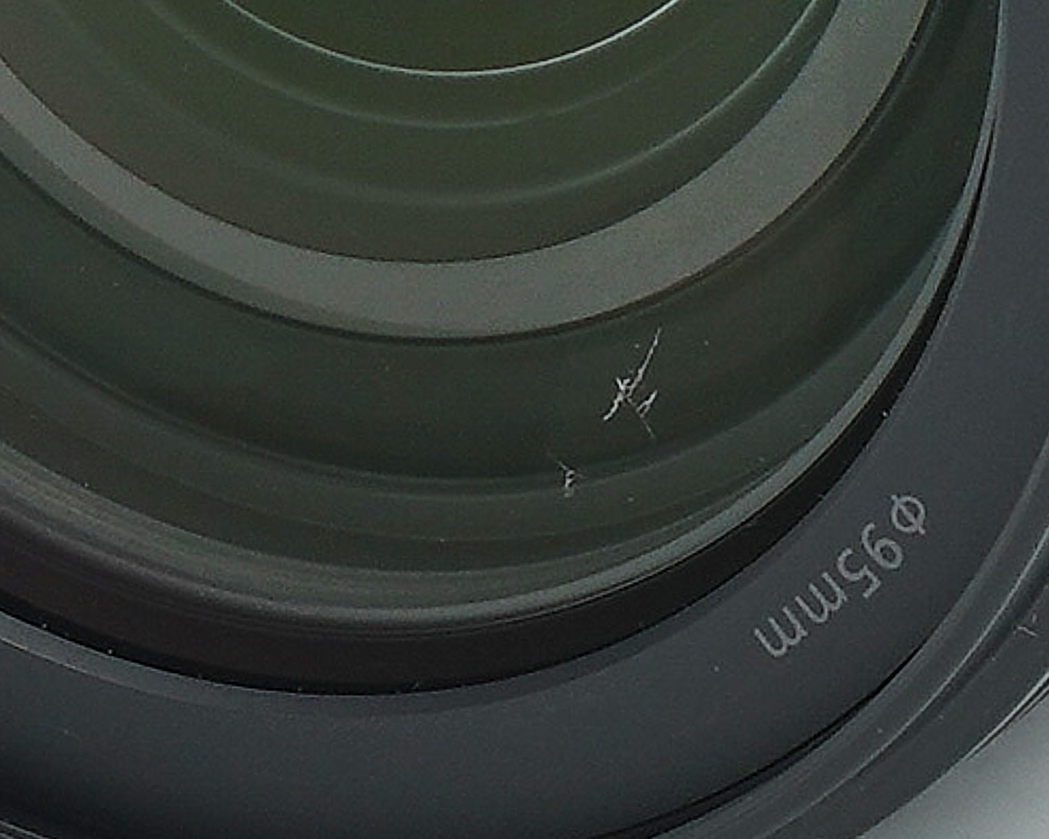 Objektiv, Frontes Element, Glas, Beschädigt, Metallring