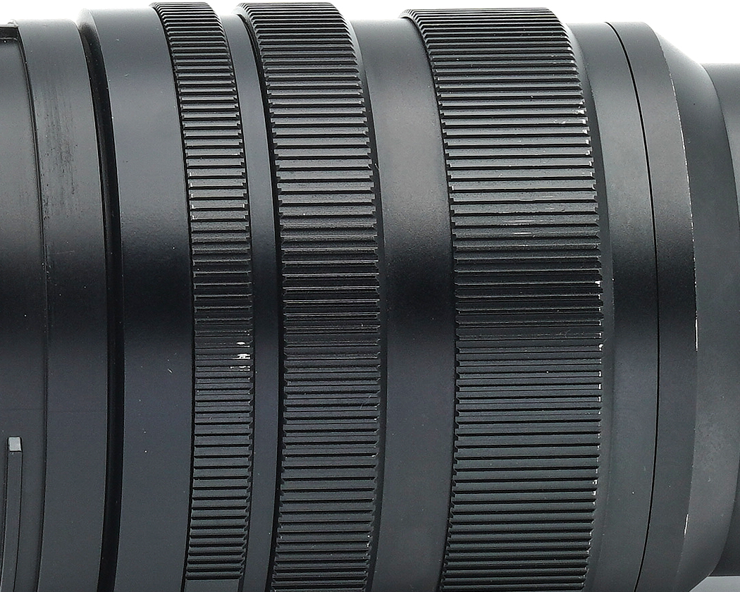 Kameraobjektiv, Objektivgehäuse, Fokusring, Rändelung, Metall, Schwarz