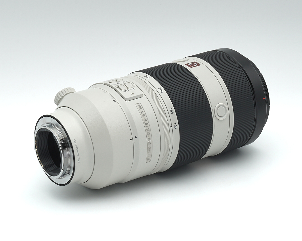 Teleobjektiv, Kameraobjektiv, weiße Linse, Metalloberfläche, Montierungsrückseite