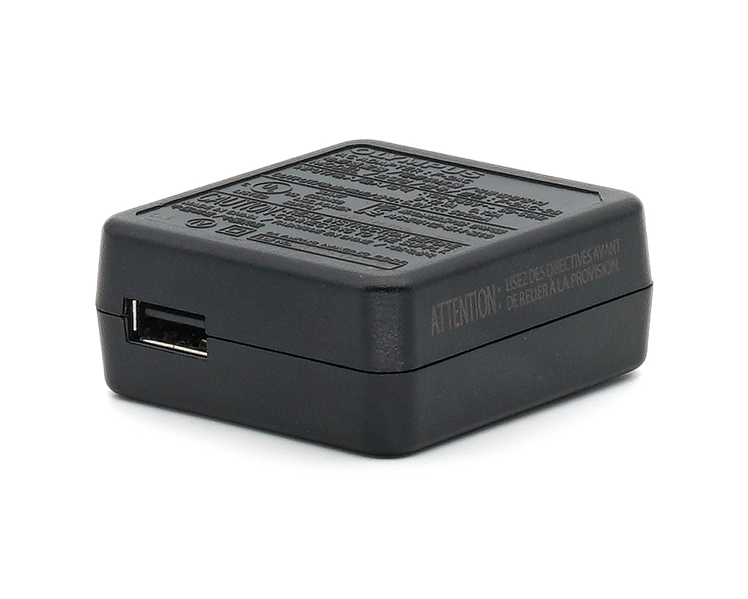 Olympus F-2AC Netzteiladapter Messeware, Sonderposten #*